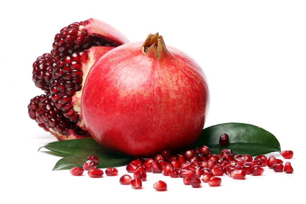 exotic-delicious-pomegranate-white-background